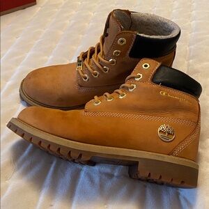 Champions Timberlands big kid size 5.5